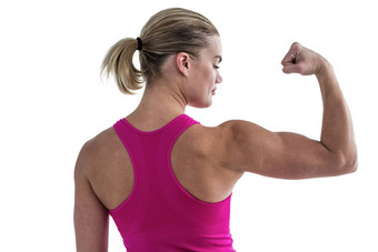 后视图<strong>肌肉</strong>发达的女人弯曲<strong>肌肉</strong>