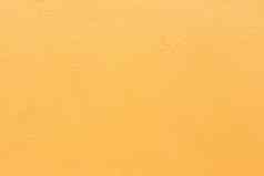 摘要黄金背景黄色的颜色光角落里关注的焦点微弱的橙色古董难看的东西背景纹理黄金黄色的纸布局设计温暖的色彩斑斓的背景