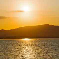 基克拉迪群岛山希腊日落天空地中海红色的
