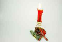 圣诞节装饰红色的蜡烛孤立的白色