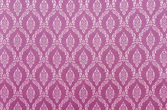 背景泰国风格粉红色的织物