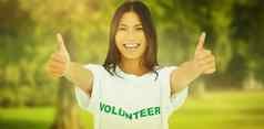 复合图像女人穿志愿者T恤给拇指