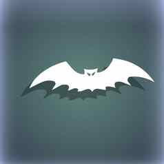 蝙蝠图标象征蓝绿色摘要背景影子空间文本