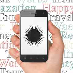 旅游概念手持有智能手机太阳显示