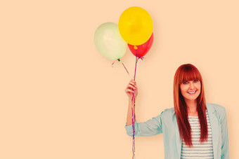 复合图像微笑赶时髦的人女人持有气球