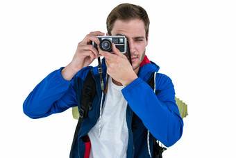 背包客赶时髦的人采取图片复古的相机