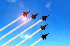 军事用特技飞行的飞机形成蓝色的天空空气显示
