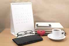 桌面咖啡电话堆栈书钱包心eyeglasse