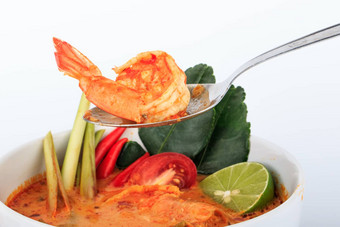 泰国虾汤柠檬草汤姆百胜龚棕色（的）布背景汤姆百胜龚泰国风格热酸虾汤