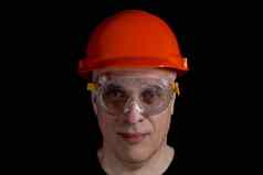 工程师手册工人男人。安全需要戴安全帽的