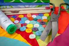 背景缝纫配件彩色的印花棉布按钮剪切机集刺绣