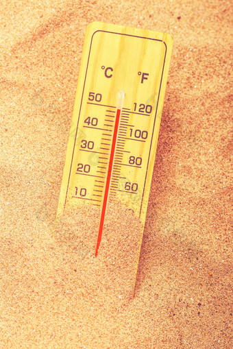 温度计极端的温暖的沙漠沙子
