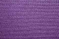 淡紫色毛茸茸的编织线程毛衣背景