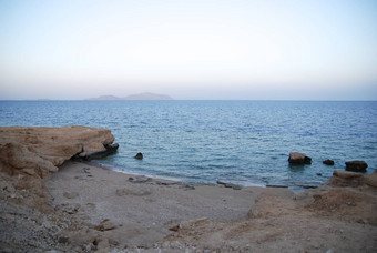 照片美丽的清晰的绿松石海海洋水表面涟漪低波海景沙子海滩背景水平图片