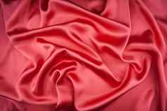 红色的缎丝绸织物背景