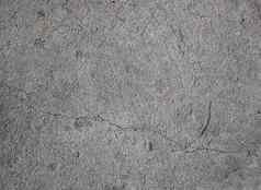 脏灰色的混凝土地板上纹理难看的东西染色背景