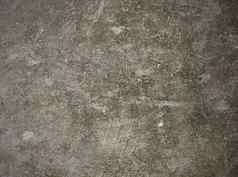 灰色的混凝土地板上纹理难看的东西染色背景