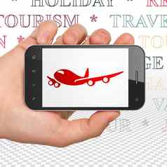 旅游概念手持有智能手机飞机显示
