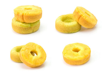 集黄色的绿色<strong>甜甜圈</strong>蛋糕孤立的白色