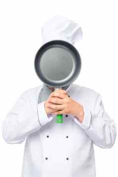 烹饪覆盖脸黑色的煎锅白色背景