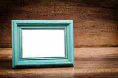 蓝色的空白照片框架木房间