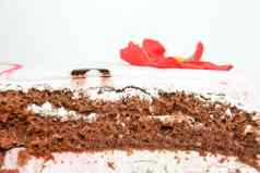 蛋糕朱红色花装饰照片
