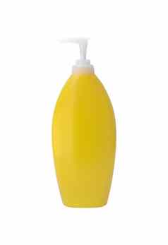 黄色的化妆品瓶泵隔离白色背景