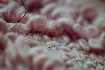 宏特写镜头软粉红色的织物背景