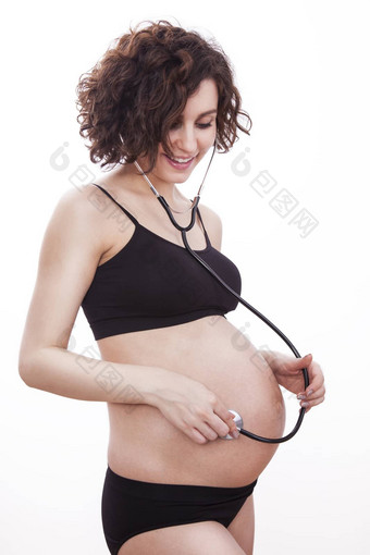 怀孕了女人听孩子听诊器