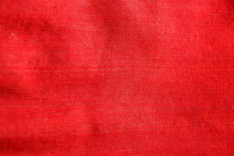 特写镜头红色的传统的织物布纹理纺织细节背景