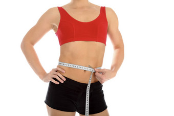运动女人测量磁带轮腰