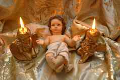 圣诞节卡婴儿耶稣点燃蜡烛