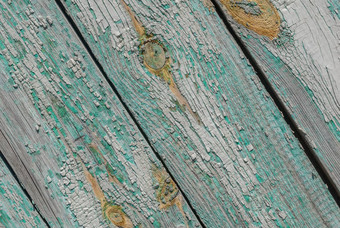 木表面裂缝剥油漆芯片油漆绿松石纹理背景