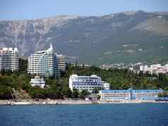 奢侈品酒店海滩海背景高绿色山