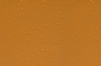 宏拍摄橙色<strong>冒泡</strong>的泡沫钙维生素<strong>冒泡</strong>的平板电脑透明的玻璃橙色颜色纹理背景