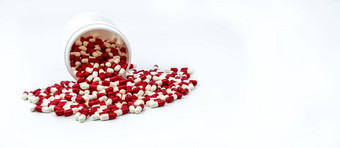 色彩斑斓的抗生素胶囊药片塑料瓶孤立的白色背景药物电阻抗生素药物合理的抗生素药物过度使用制药行业药店背景