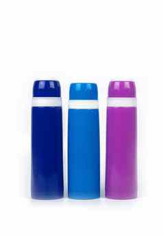 蓝色的紫色的热水瓶瓶孤立的白色背景复制空间
