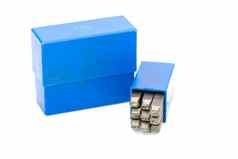 集金属邮票数量穿孔蓝色的塑料盒子孤立的白色背景