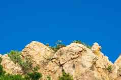 岩石悬崖美丽的清晰的蓝色的天空仙人掌山