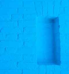 现代霓虹灯蓝色的彩色的砖墙纹理背景空框架开放