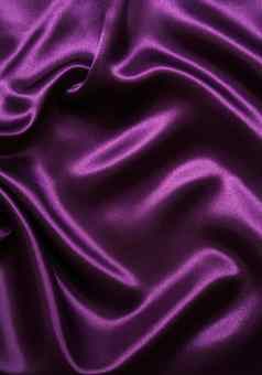 光滑的优雅的淡紫色丝绸背景光滑的优雅的