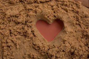 心形状使沙子背景