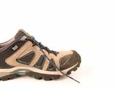 衣服徒步旅行靴子鞋子孤立的细枝背景使皮革防水透气膜