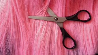 假发剪刀粉红色的假发发型背景