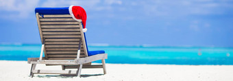 太阳椅子<strong>懒人</strong>红色的圣诞老人他热带白色海滩绿松石水