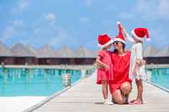 快乐家庭圣诞老人帽子圣诞节热带假期