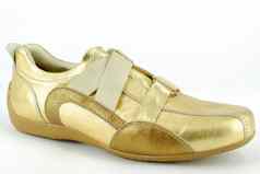 女人黄金运动鞋鞋