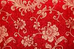传统的中国人花模式红色的织物