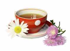 红色的杯子茶甘菊粉红色的野生花
