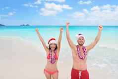 快乐圣诞节假期夫妇夏威夷海滩